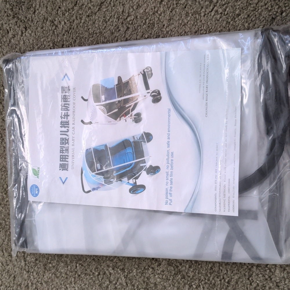 NWT universal stroller rain cover